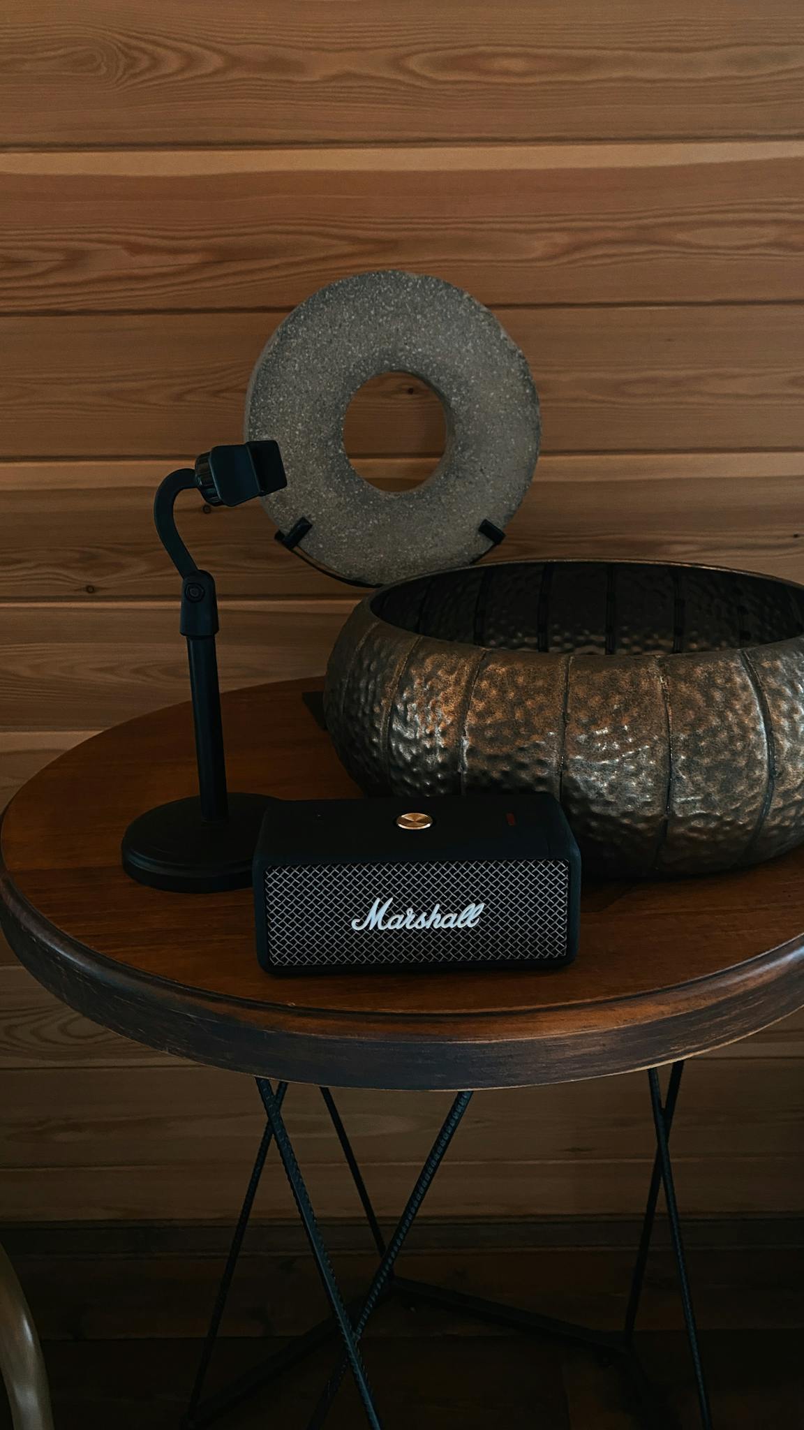 A modern setup with decorative items on a wooden table, emphasizing style and design.